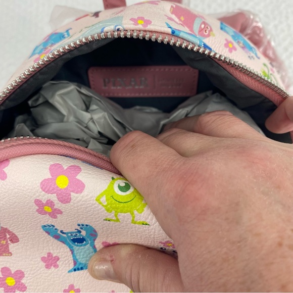Danielle Nicole Pixar Monsters Inc Pink Mini Backpack - Picture 3 of 6